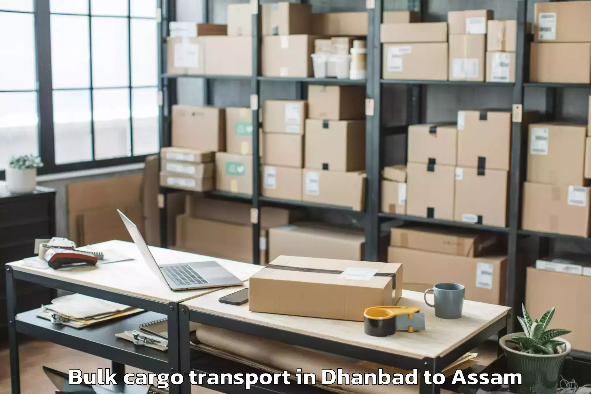 Easy Dhanbad to Tezpur University Bulk Cargo Transport Booking